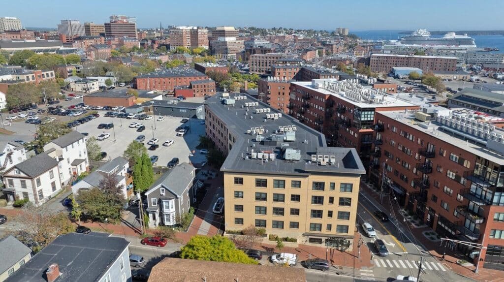 Aerial drone view of a modern city skyline captured from above.