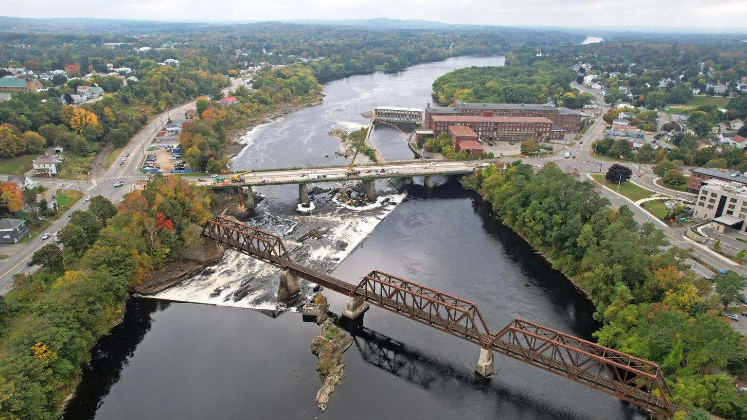 Aerial drone perspective of bridge and river landscape in Maine, supporting commercial and marketing visual storytelling
