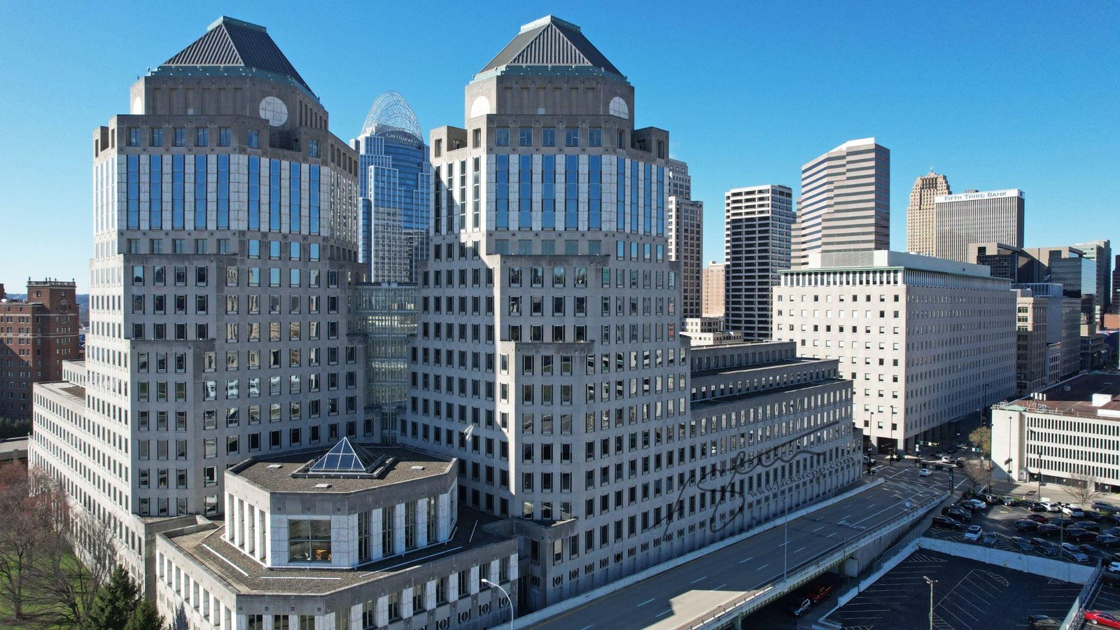 Aerial drone view of the Procter & Gamble Towers and surrounding commercial high-rises.