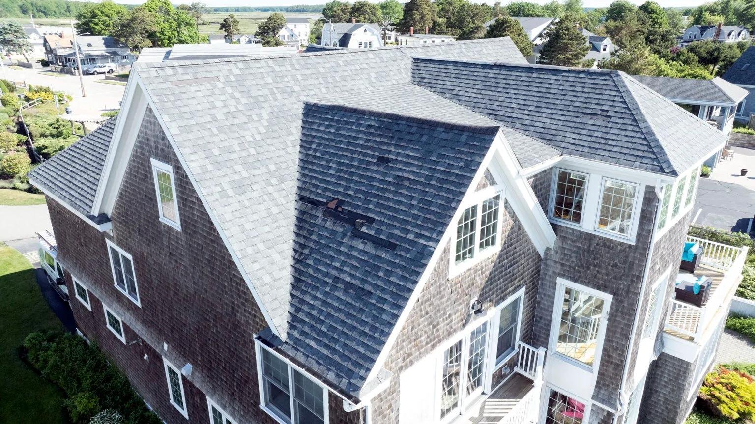 close-up of a house's roof being inspected by a drone