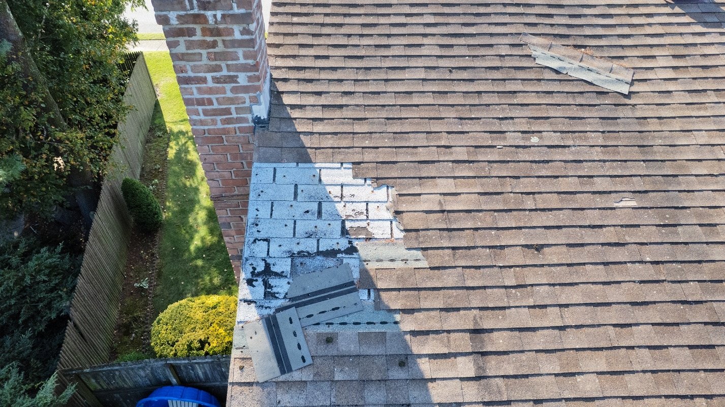 Close-up aerial drone photograph of roof shingles