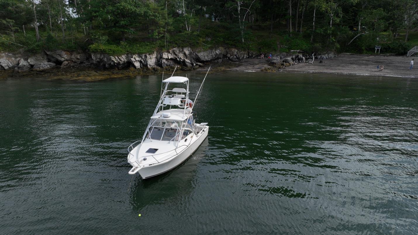 Boat viewed from above on open water